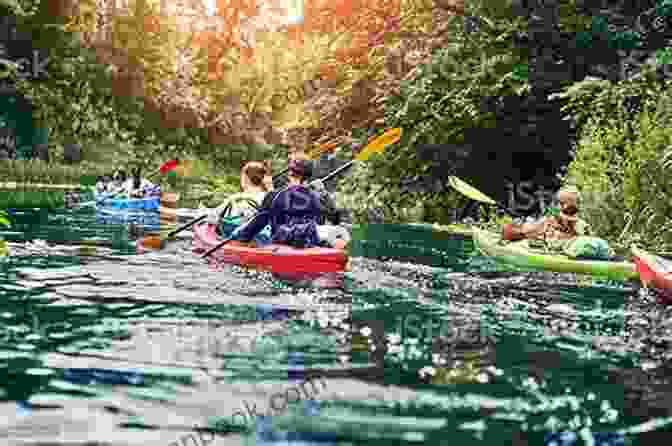 A Group Of People Kayaking Through A Scenic River, Surrounded By Towering Cliffs And Lush Vegetation. Adventure Is Out There: OVER 50 CREATIVE ACTIVITIES FOR OUTDOOR EXPLORERS
